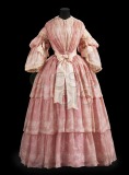 Woman’s dress in pink wool,...