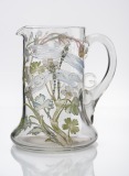 Flower patterned glass water jug...